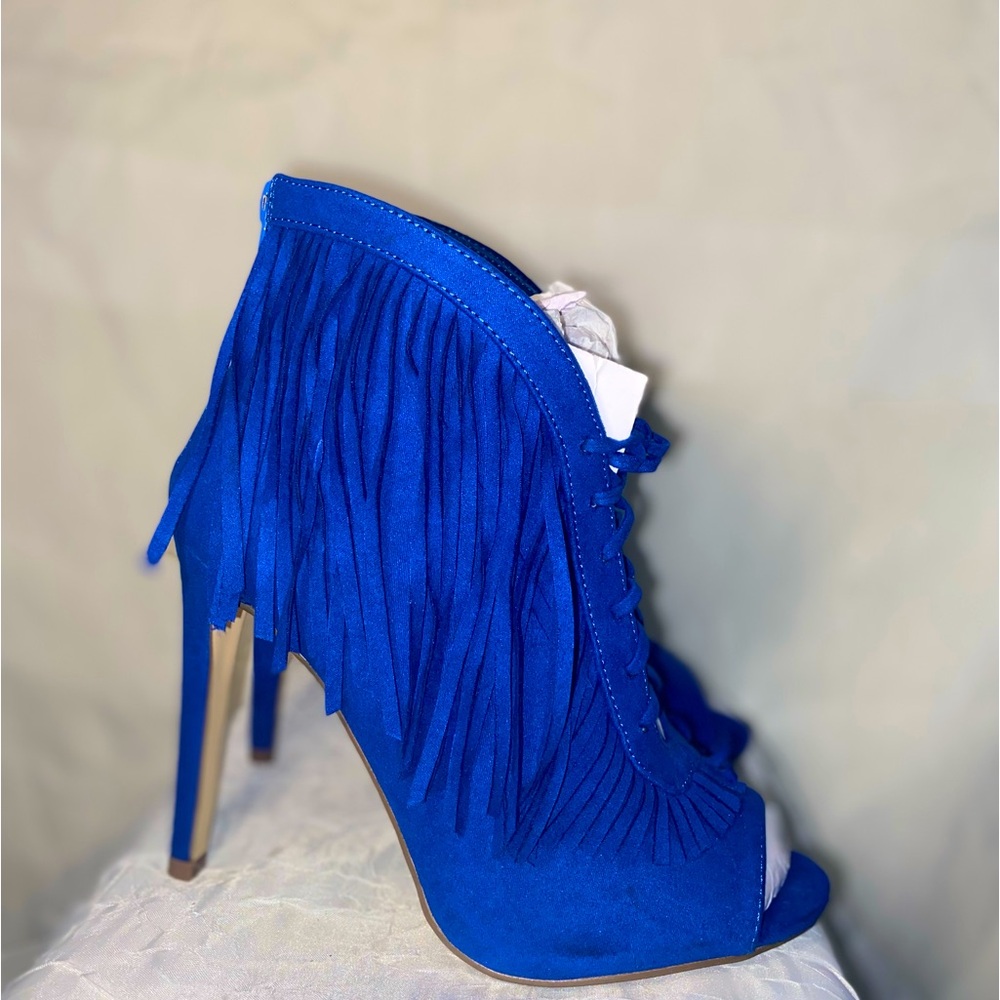 Blue open toe booties with fringe
